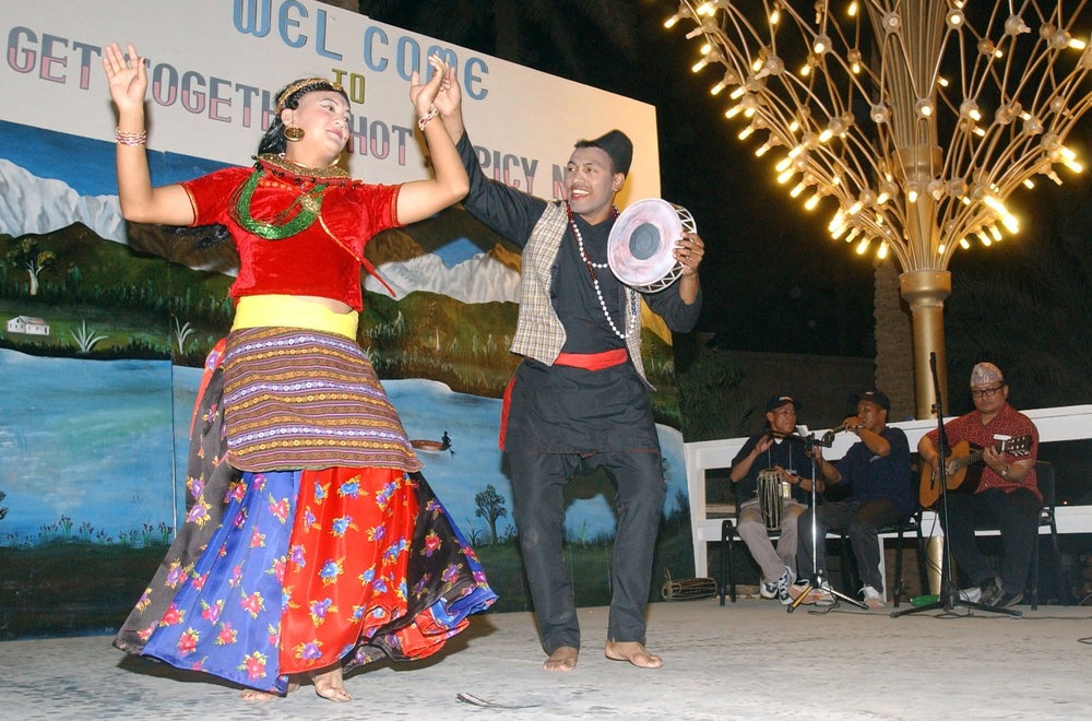 Krishna Ghale (right) and Dhansing Tamang dance