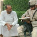 Capt. Paul T. Agena talks with local leaders