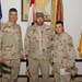 Toby Keith and Major General David Rodriguez pose with soldiers