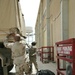 Soldiers load up their truck with exchanged items