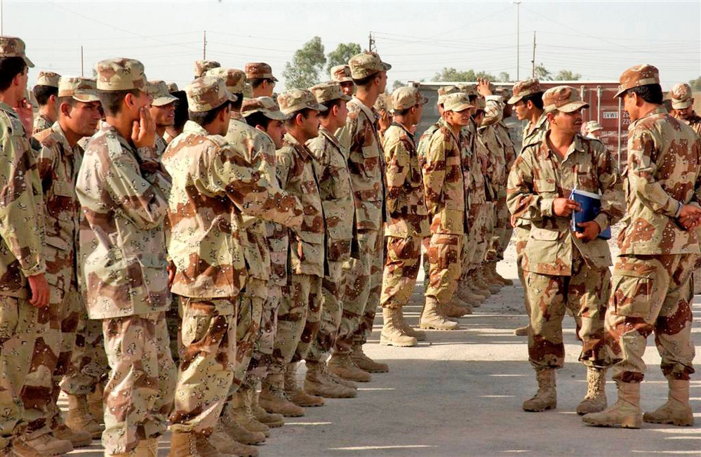 Iraqi Soldiers get into a formation for a briefing Iraqi Soldiers get into a formation for a briefing