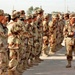 Iraqi Soldiers get into a formation for a briefing