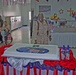 Sgt. Maj. William Grant is all smiles as he cut the cake