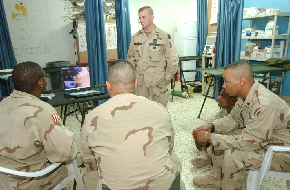 SSgt. James Elmer shows the medics in his unit a video