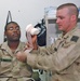 SSgt. James Elmer applies the new Hemcon bandage