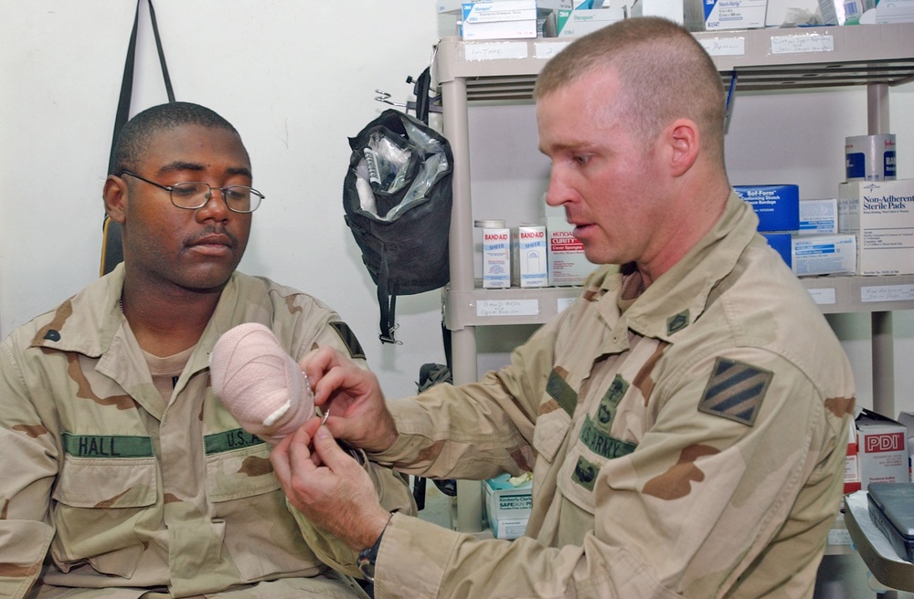 SSgt. James Elmer applies the new Hemcon bandage