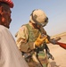 Staff Sgt. Logan Siebert checks the serial number