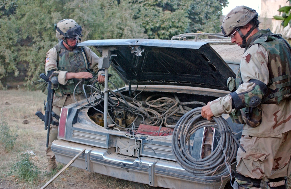 Sgt. Pete Pinnel along with Spc. Ryan Kocher