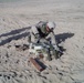 Senior Airman Benbrooks places C4 explosives on a pile
