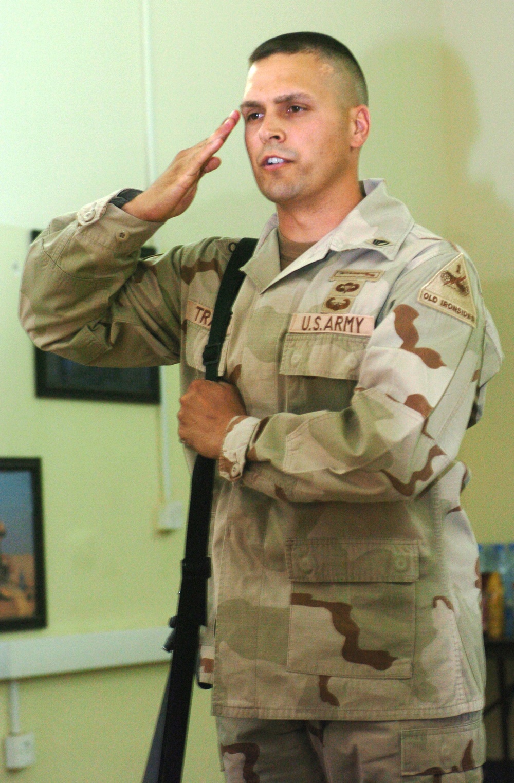 Staff Sgt. George Traver salutes during a board