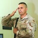 Staff Sgt. George Traver salutes during a board