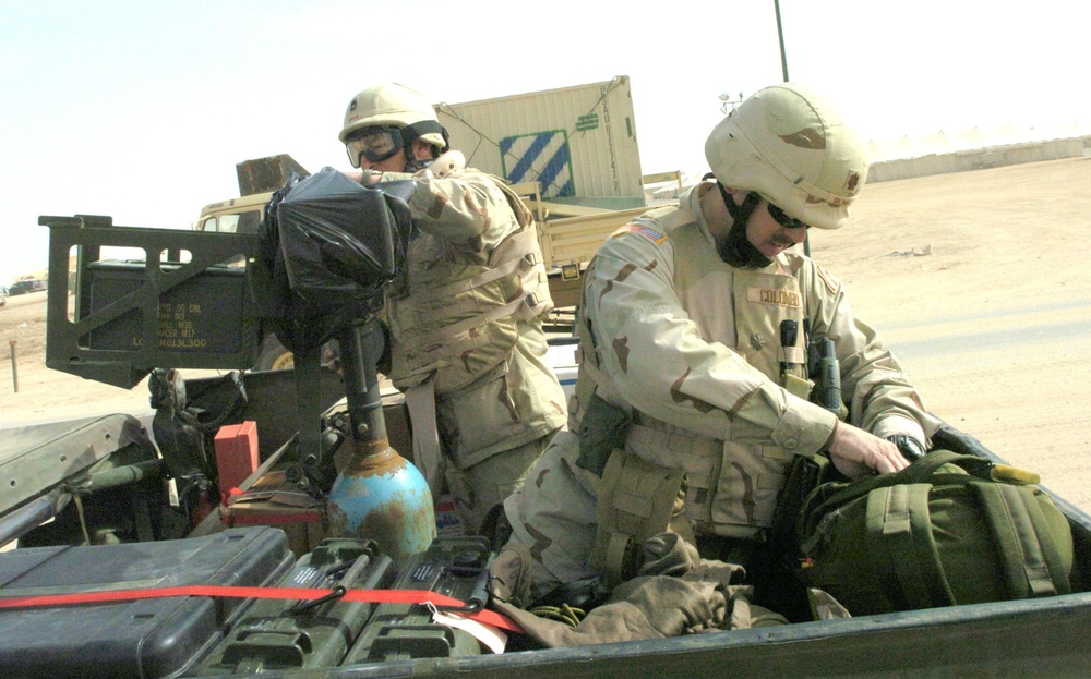 42nd Infantry Division Soldiers prepare their weapons and equipment