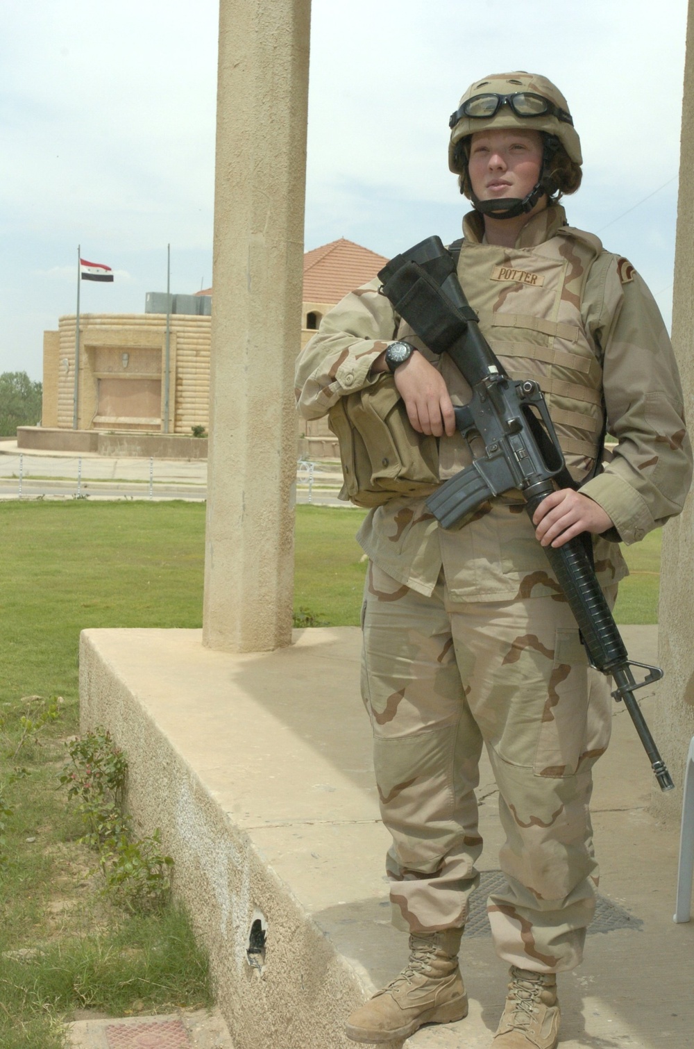 Spc. Kristen Potter guards the bridge to the Iraqi Army and Police training