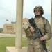 Spc. Kristen Potter guards the bridge to the Iraqi Army and Police training