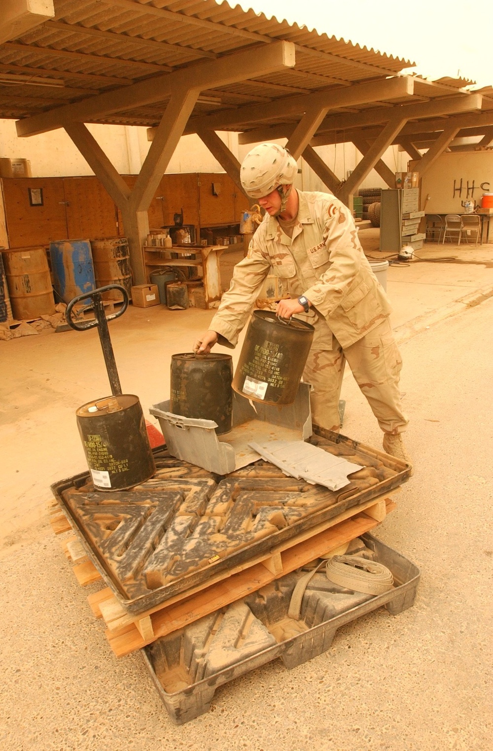 Pv2 Kenneth Geib loads a skid lift during a routine clean-up