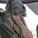 1LT Joshua Ingram buckles into his UH-60 Blackhawk