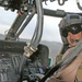 CW2 James Gisclair looks back while flying