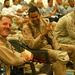 Soldiers smile for the camera at cheerleader show