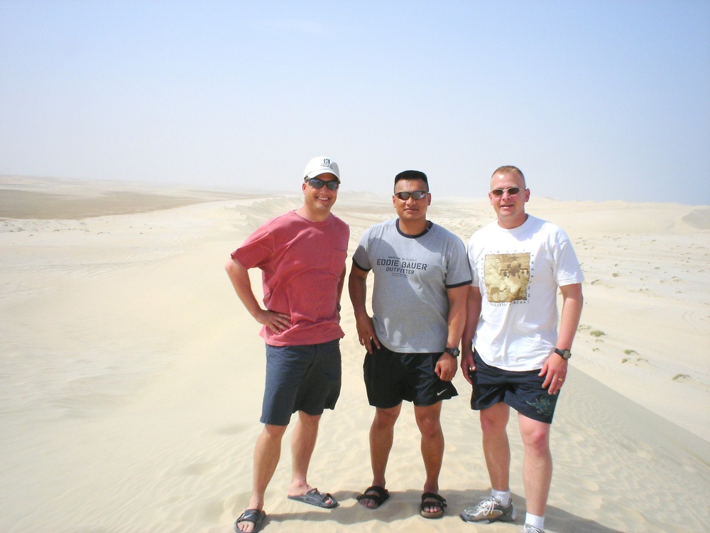 SFC Lance Milsted in civilian garb with friends