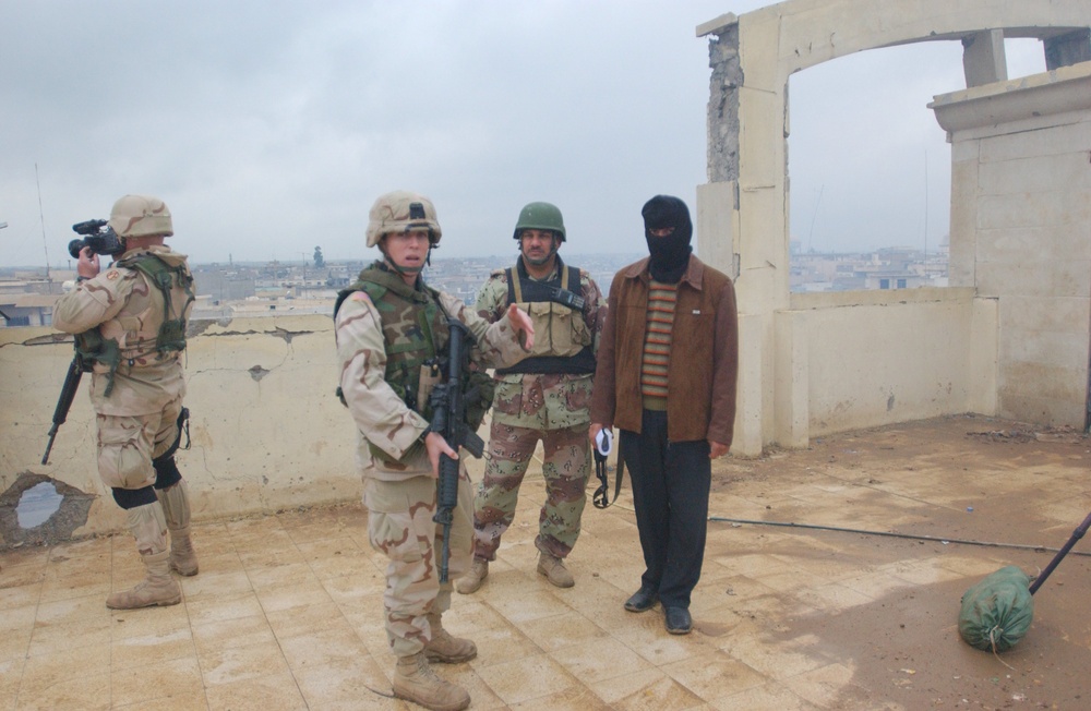 SFC Lance Milsted and camera crew