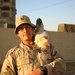 SFC Lance Milsted with a chicken