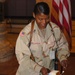 SFC Celeste Henderson pass out pieces of cake