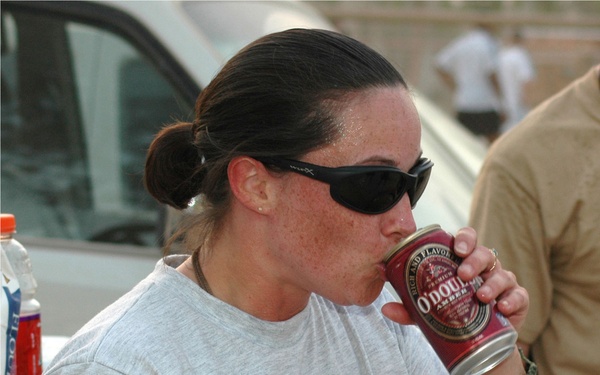 SSgt. Cheryl Migas enjoys an ice-cold nonalchoholic beer