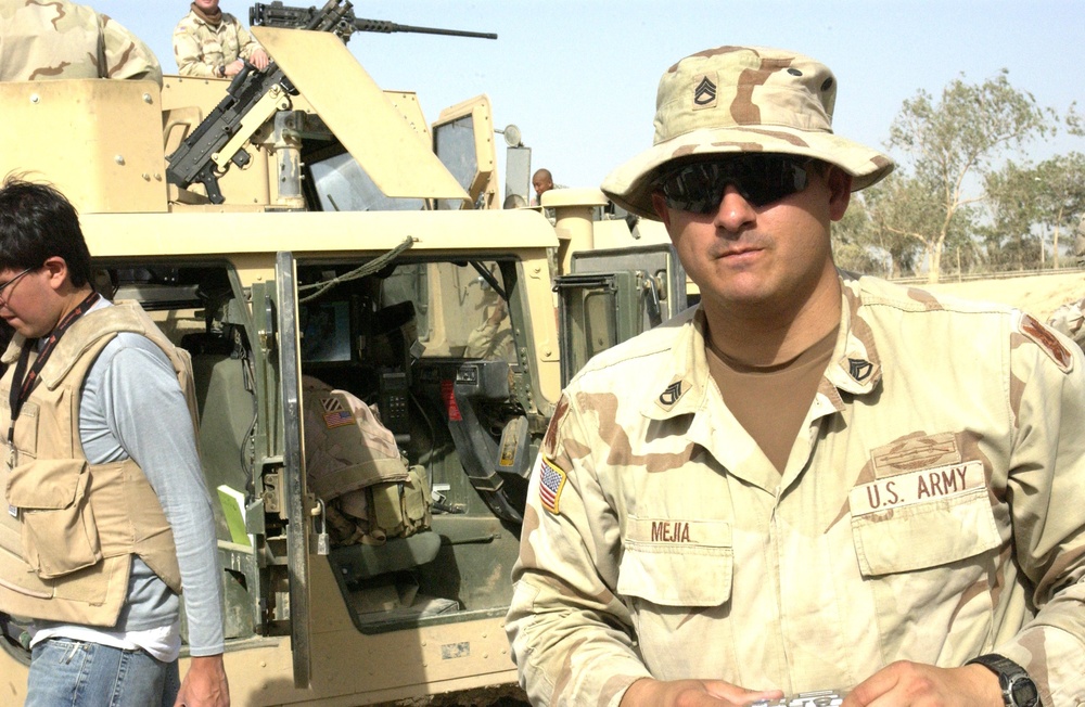 US and Iraqi Armies search for insurgents and weapon caches. US and Iraqi Armies search for insurgents and weapon caches.