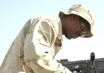 US and Iraqi Armies search for insurgents and weapon caches.