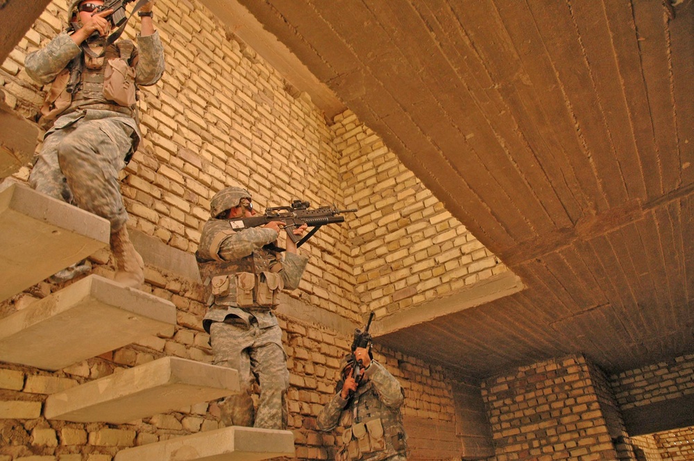 Soldiers keep their eyes peeled and weapons up