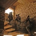 Soldiers play it safe as they head up the staircase