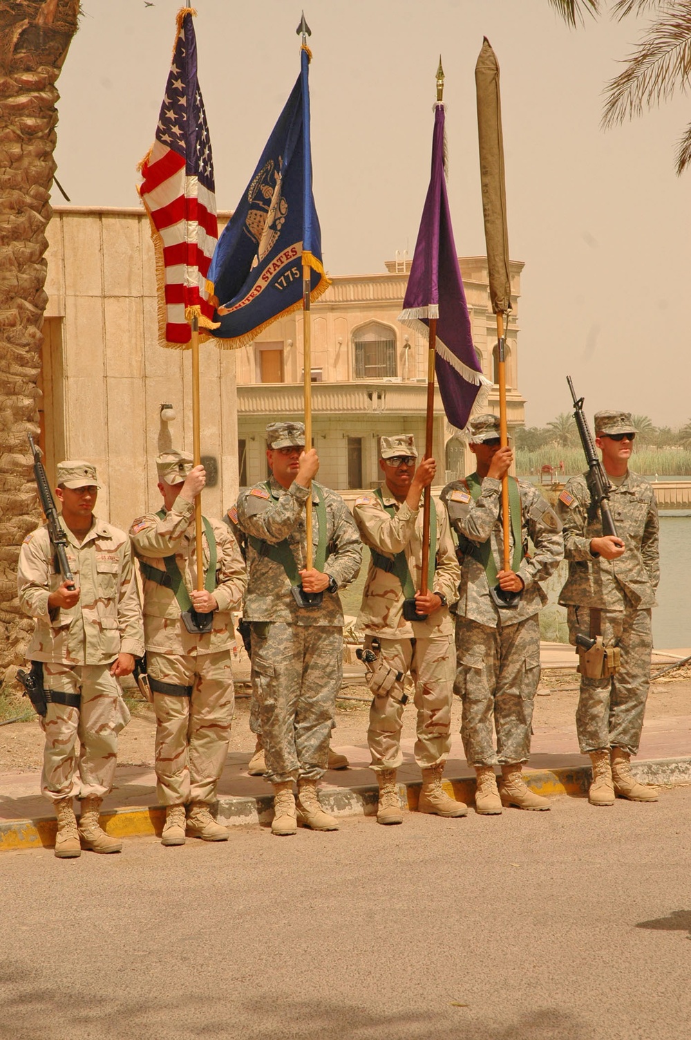 The color guard stand at the position of attention