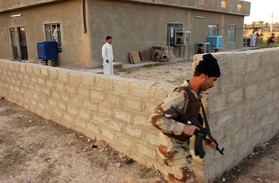 Iraqi Army soldiers searched the village of Al Julaam
