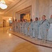 Maj. John Groth administers the oath of reenlistment