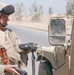 SSG Parra scans a humvees radio frequency tag with an interogat