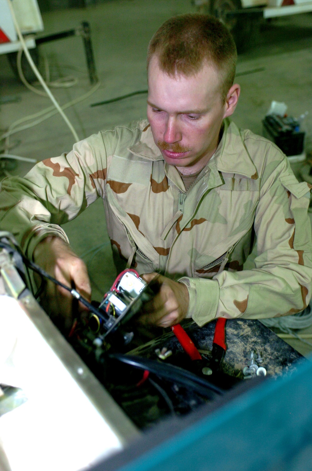 Sgt James A Fowler repairing