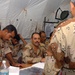 An Iraqi captain briefs an Iraqi major during a command post exercise