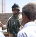Staff Sgt. John Lamott has a detailed mission briefing with memb