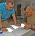 Sgt. Charles Gallego and  Spc. Bryan Myers