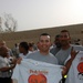 1LT Venton and Sgt Kelly show off their prized Peachtree Road Race t-shirts