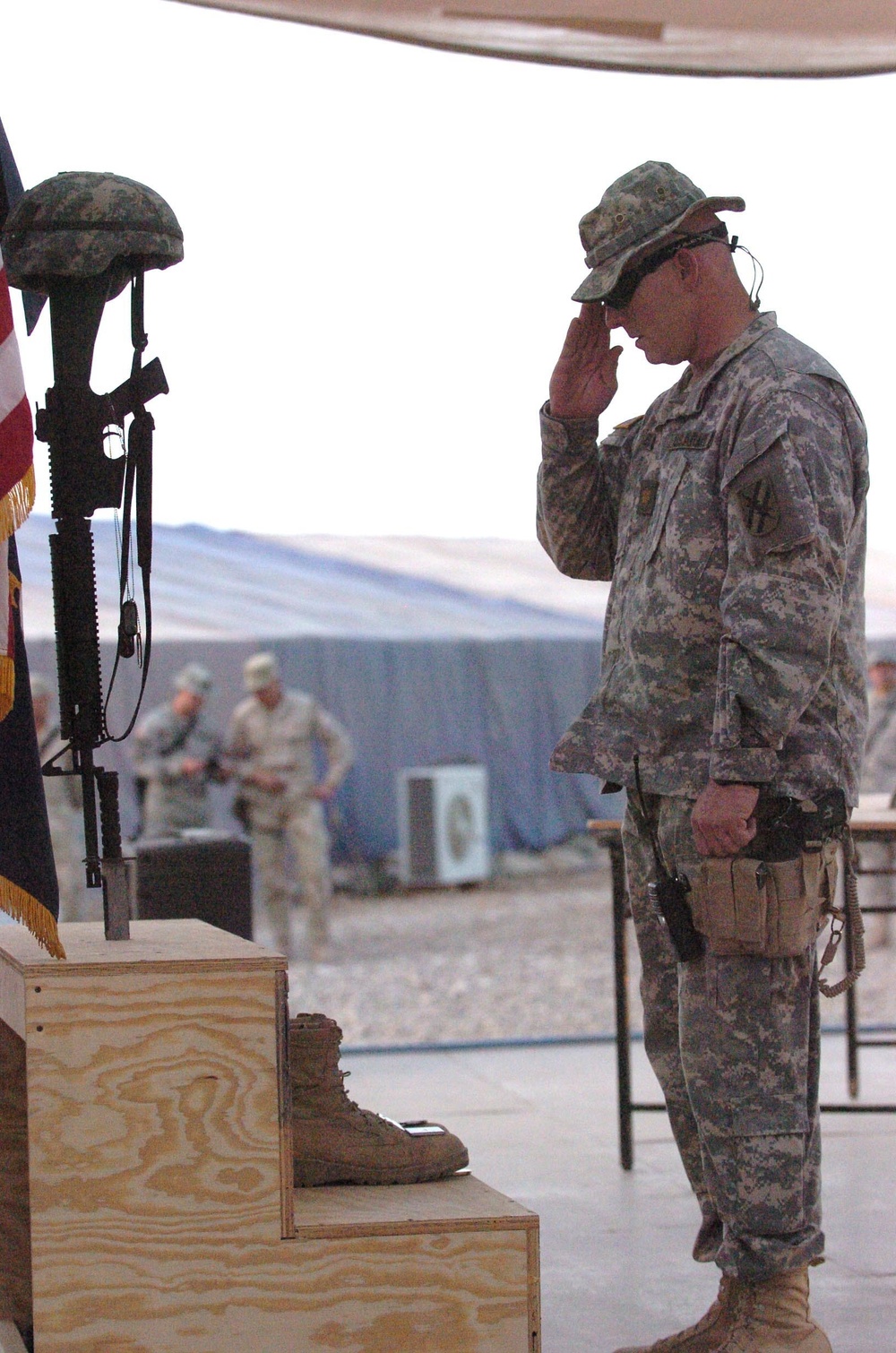 Maj Jeffery Dickerson gives final salute as tribute to Sgt. Chad Mercer