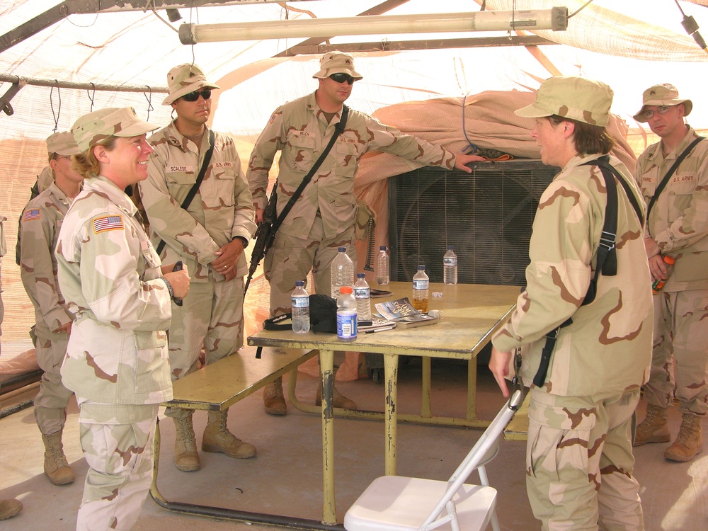 Soldiers talk with Vermont Adjutant General Martha Rainville