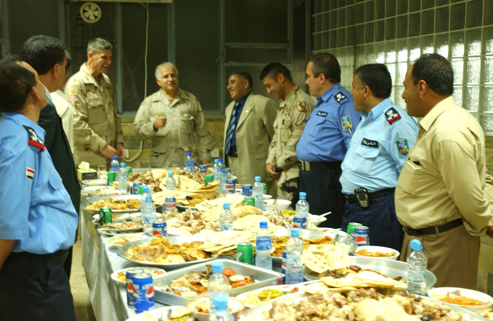 The Police Chief of Mosul, Maj. Gen. Rodriguez and other guests have lunch