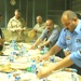 The Police Chief of Mosul, Maj. Gen. Rodriguez and other guests have lunch