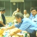 The Police Chief of Mosul, Maj. Gen. Rodriguez and other guests have lunch