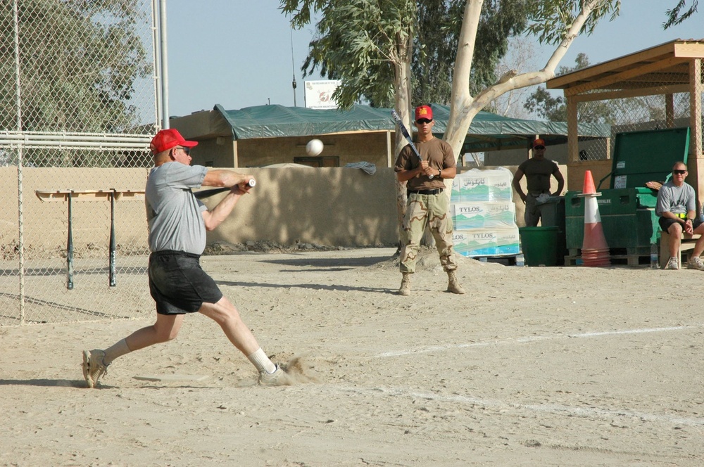 A Soldier with team Alamo Warriors swings at the ball