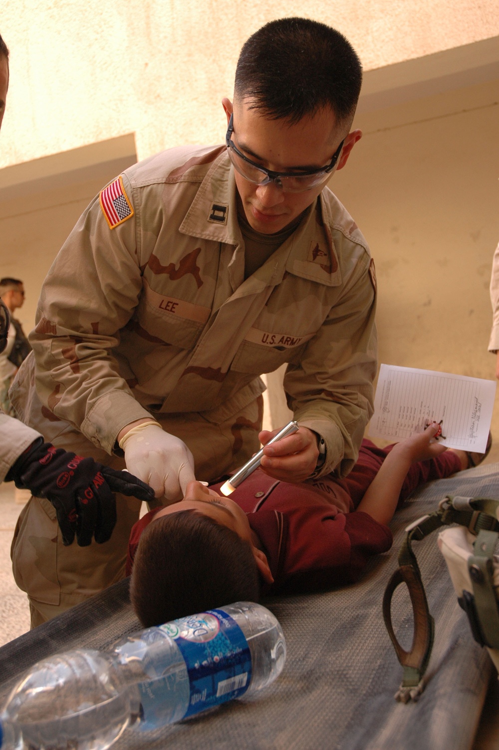 Capt. Cyrus J. Lee Conducts Dental Screening