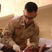 Capt. Cyrus J. Lee Conducts Dental Screening