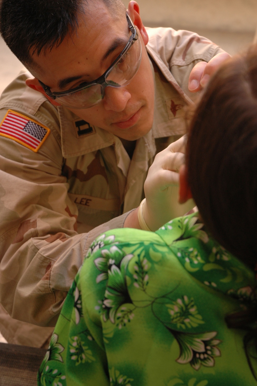 Capt. Cyrus J. Lee Conducts Dental Screening