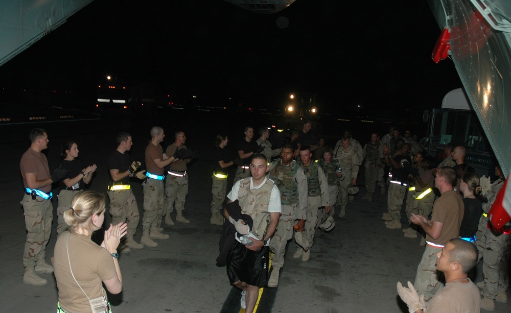 Servicemembers and Volunteers Sending Off